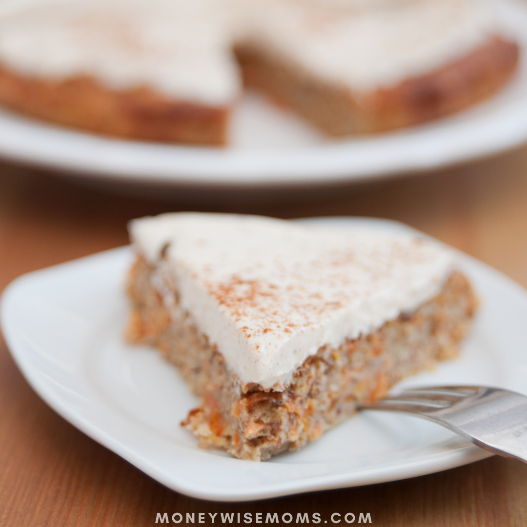 slice of carrot cake with cinnamon cream cheese frosting