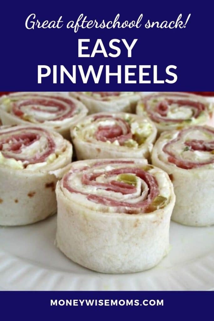 Salami cream cheese pickle pinwheels on white plate