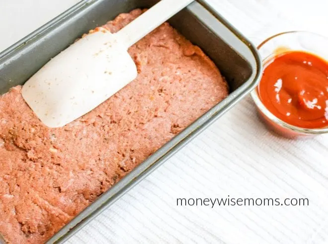 Press ground turkey meatloaf into pan