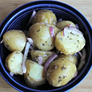 So easy! This Oil and Vinegar Potato Salad is so simple but is so flavorful. Good both warm and cold!