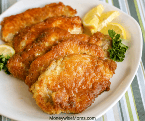 These delicious breaded pork chops are easy to make and great for weeknight dinners! A simple breaded pork chop recipe that has breading which doesn't crumble! My tasty pork chops make an excellent gluten free option for dinner as well. 