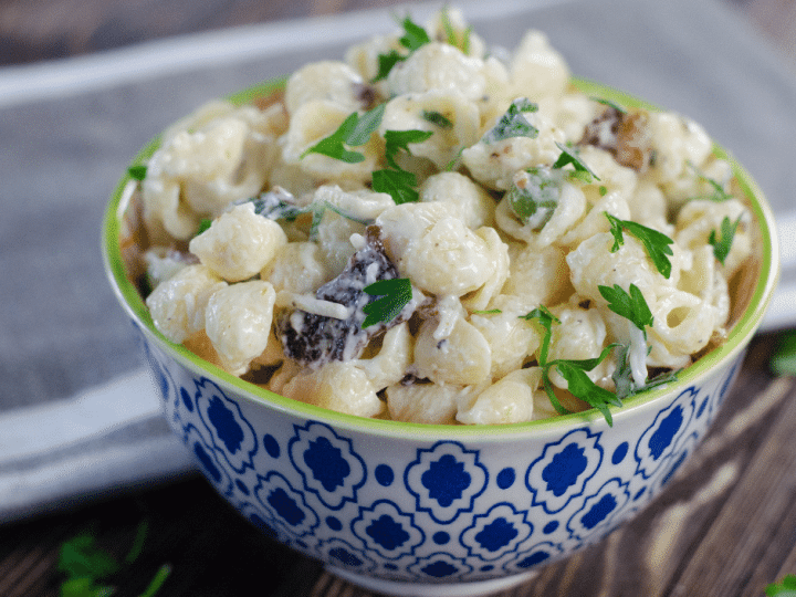 Creamy Bacon Parmesan Pasta Salad in a blue and white bowl, ready to eat.