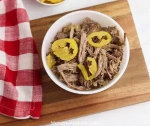 This Italian beef recipe is so easy and delicious. Now that we're back to school we need dinner recipes that require zero fuss! Crockpot dinner recipes are always a winner in my book. Everything goes in and dinner comes out. Not to mention the leftovers are great for lunches in sandwiches or wraps. 