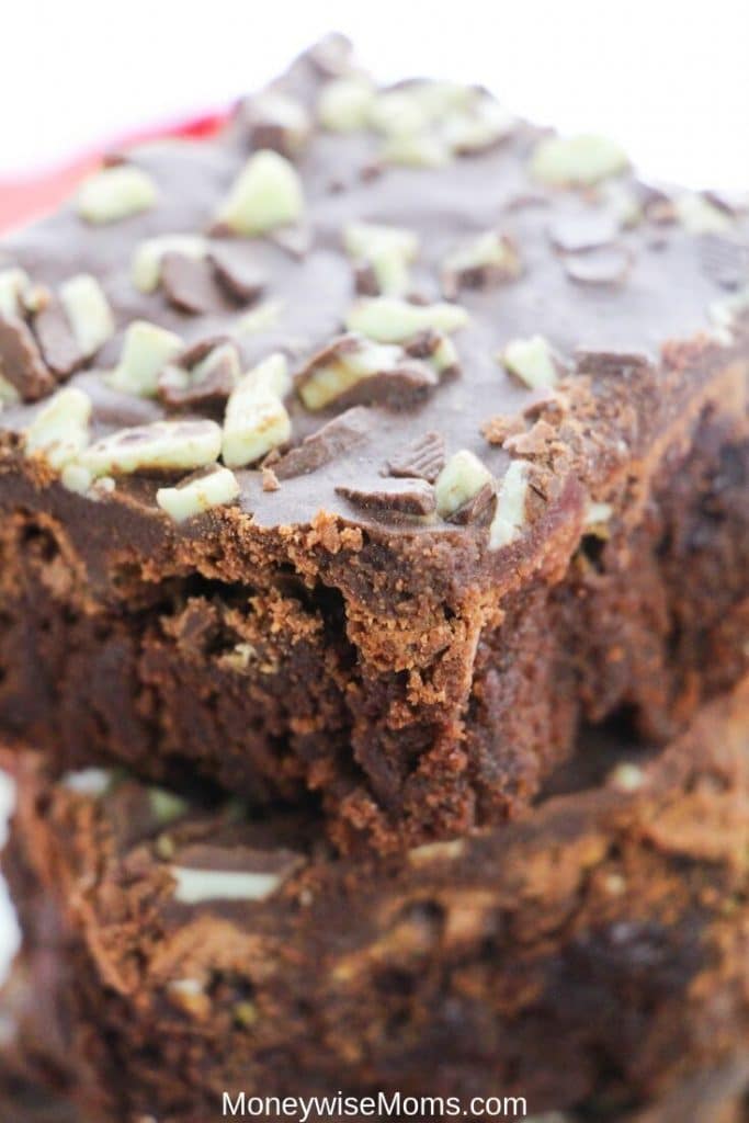 Mint Chocolate Brownies in stack on red plates