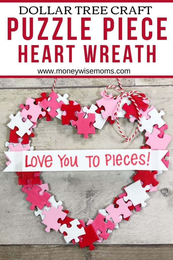 Pink red and white Valentine wreath made from painted puzzle pieces