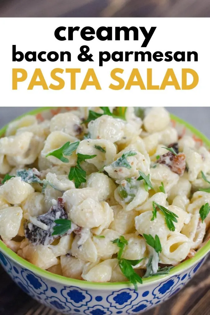 close up of bacon parmesan pasta salad in white and blue bowl