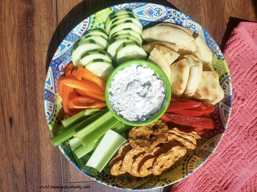 Featured image showing the finished everything bagel seasoning dip in the center of a veggie and cracker tray.