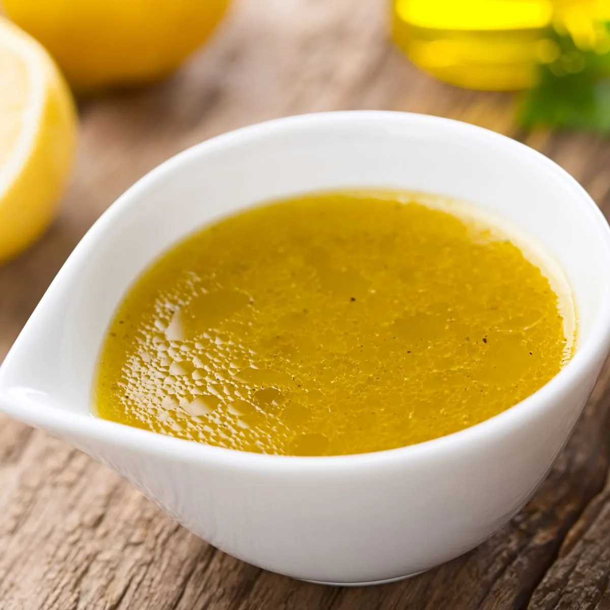 white container of mustard vinaigrette dressing