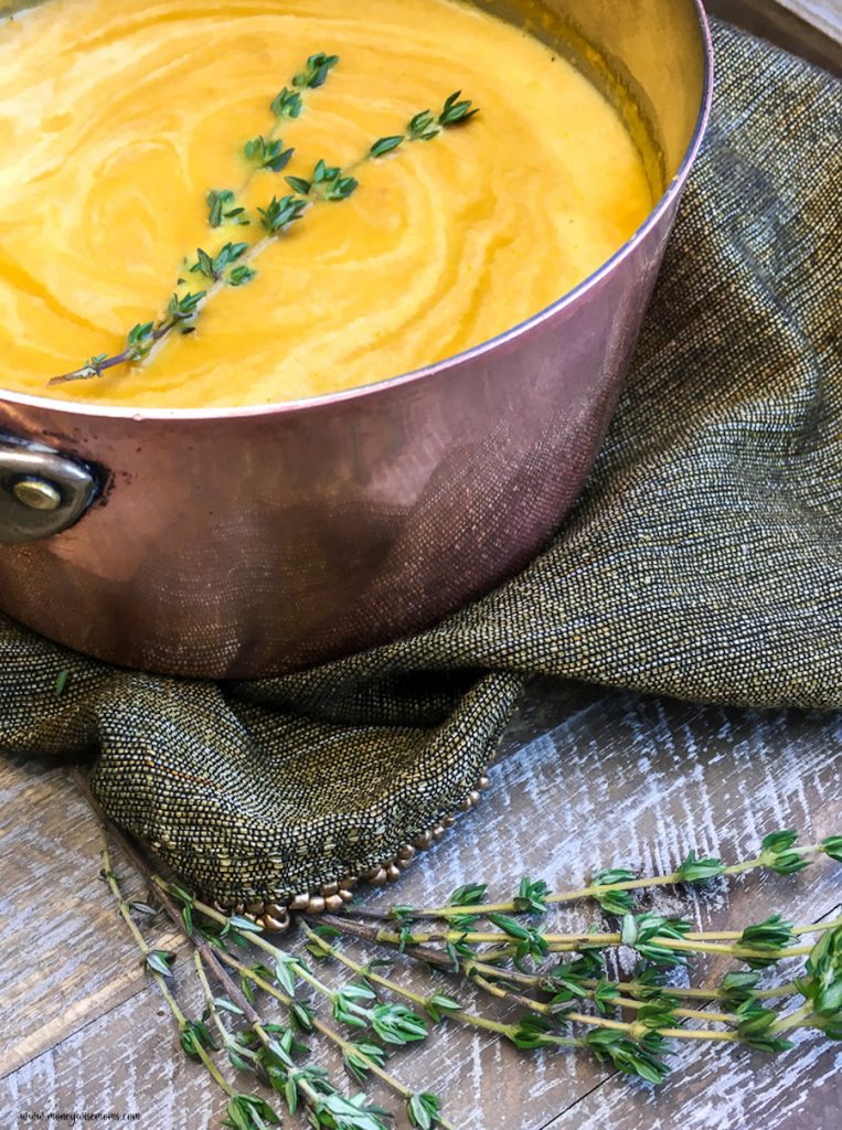 A beautiful shot of a pot of the finished soup ready to serve. 