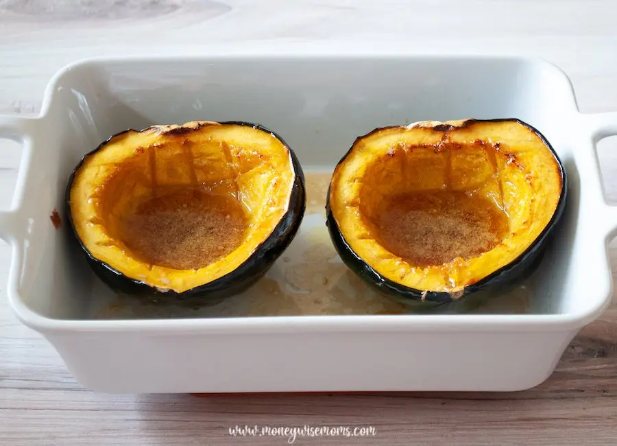 Here we see the baked acorn squash ready to be removed from the baking pan and served. 