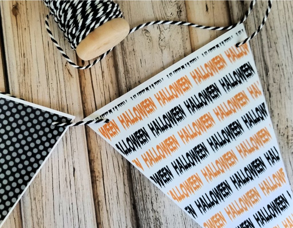 printed Halloween bunting on wooden background