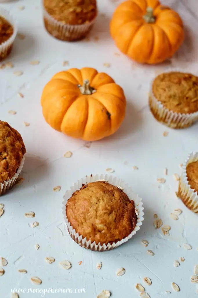 A top down view of the finished pumpkin muffins with oats