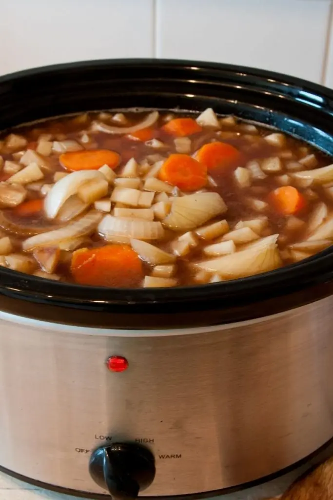 Onions and carrots in crockpot meal planning