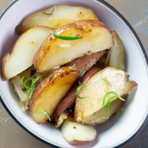 Roasted potatoes in white dish SQ