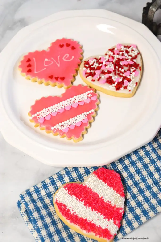 A variety of cookies each decorated differently for valentine's day. 