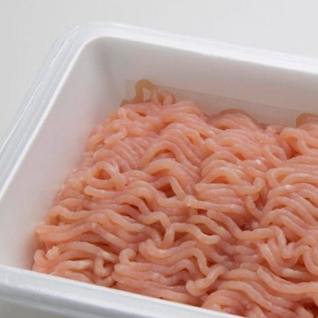 Raw ground turkey in package