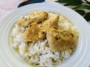 Featured image showing the finished crockpot lemon pepper chicken recipe ready to be enjoyed.