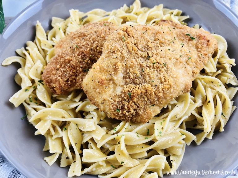 Featured image showing the finished parmesan crusted chicken with buttered noodles ready to eat.