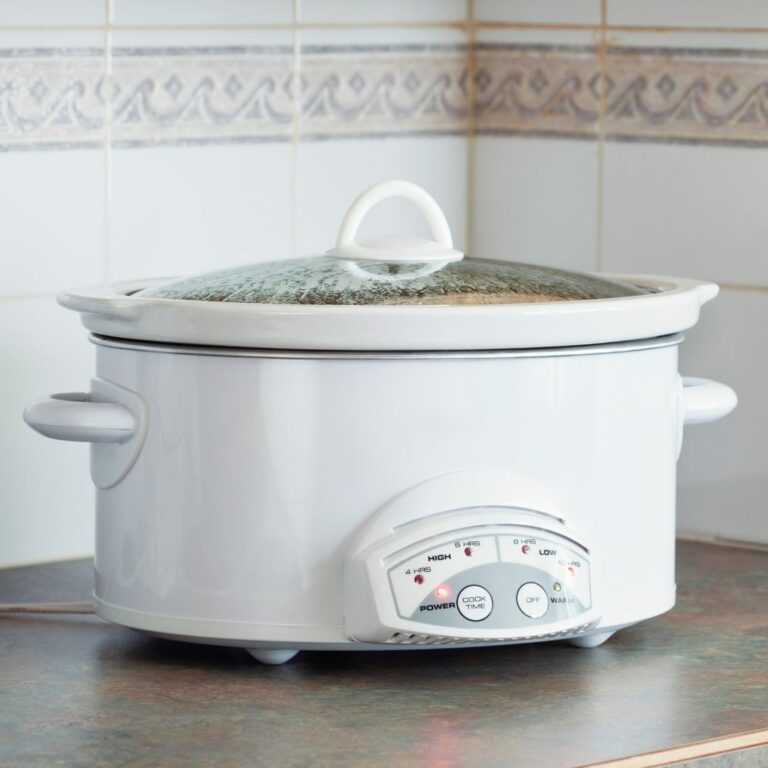 White crock pot on counter
