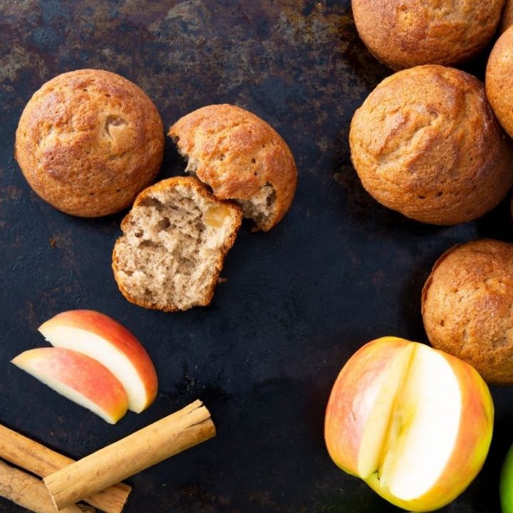 cinnamon maple muffins with cinnamon stick and apple slices