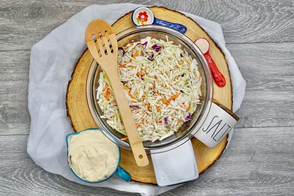 cole slaw in a bowl ready to be topped with dressing. 