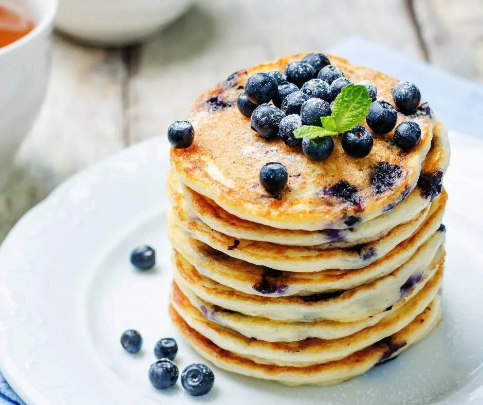 featured image showing easy blueberry recipes for pancakes.