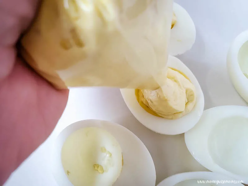 Eggs being filled with batter. 