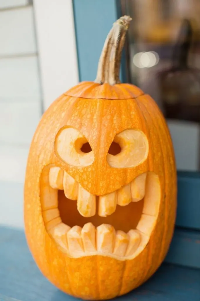 Funny Jack o Lantern carved from pumpkin - family halloween fun