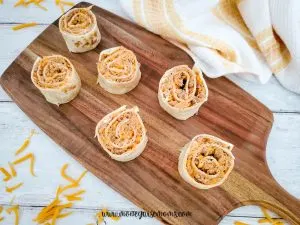 Featured image showing the finished recipe for taco pinwheels ready to eat.
