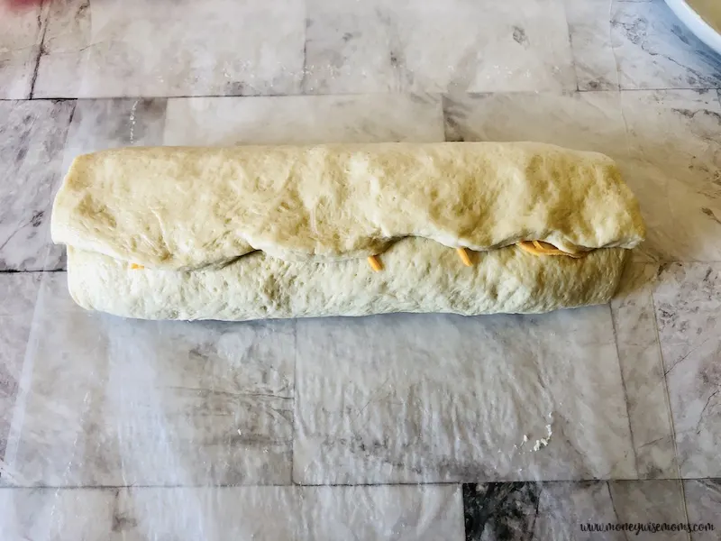 rolled up dough with filling inside. 