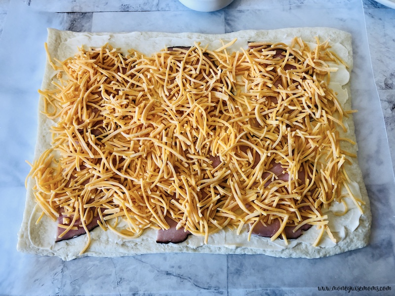 cheese spread on the ham slices. 
