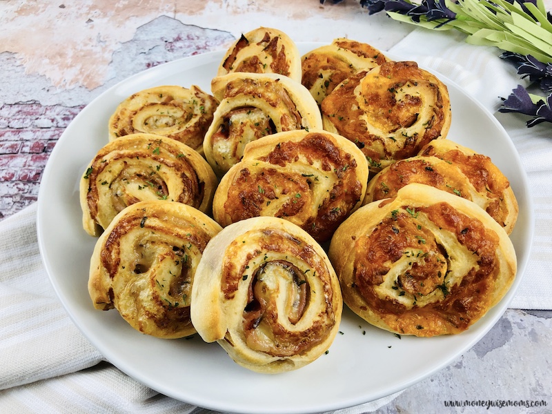 Featured image showing the finished baked ham and cheese pinwheels.