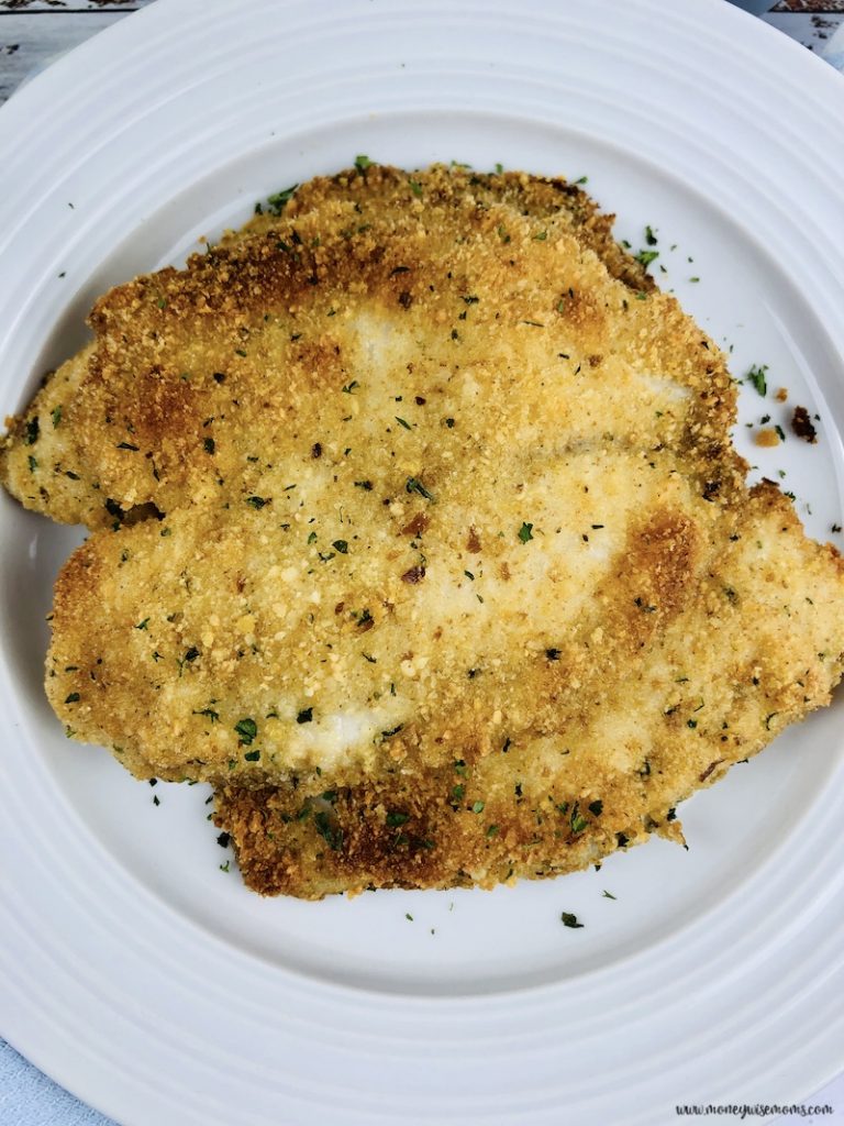 finished recipe for parmesan crusted tilapia on a plate ready to serve