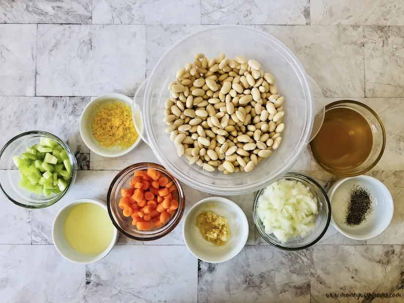 a top down view of the ingredients needed to make slow cooker bean soup