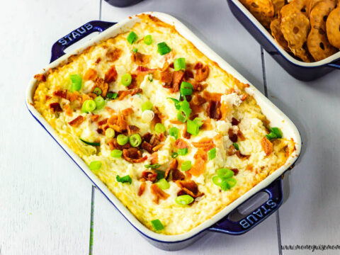 featured image showing the finished hot cheese dip with bacon ready to eat.