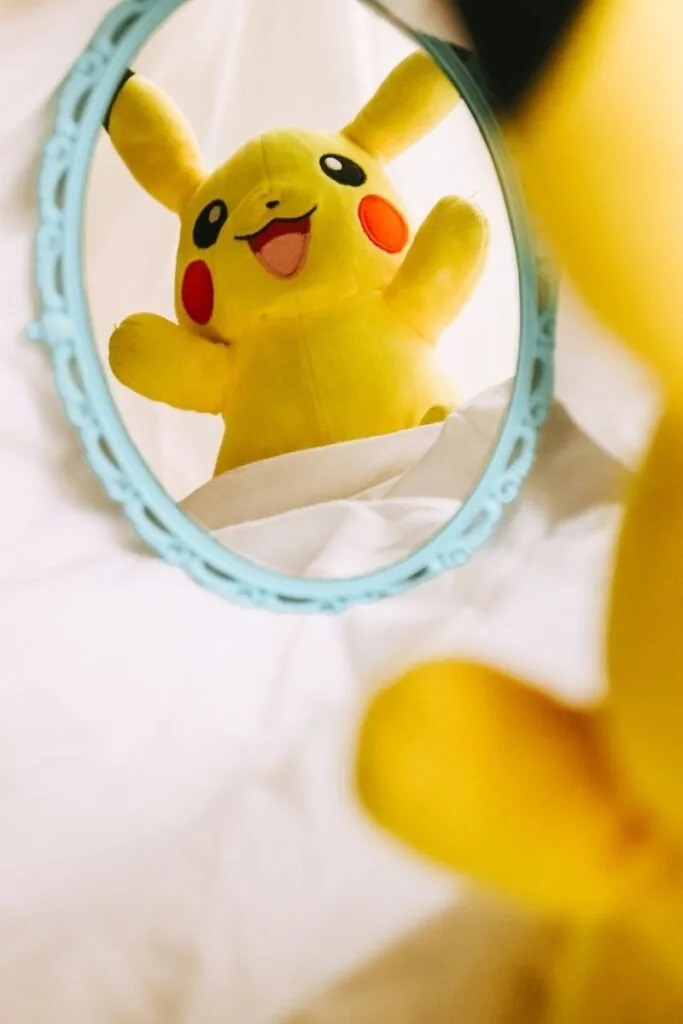 Pikachu character looking in mirror - Pikachu Christmas gifts for all ages