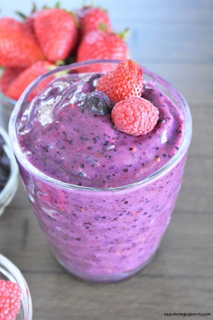 a glass of finished berry smoothie without dairy products 