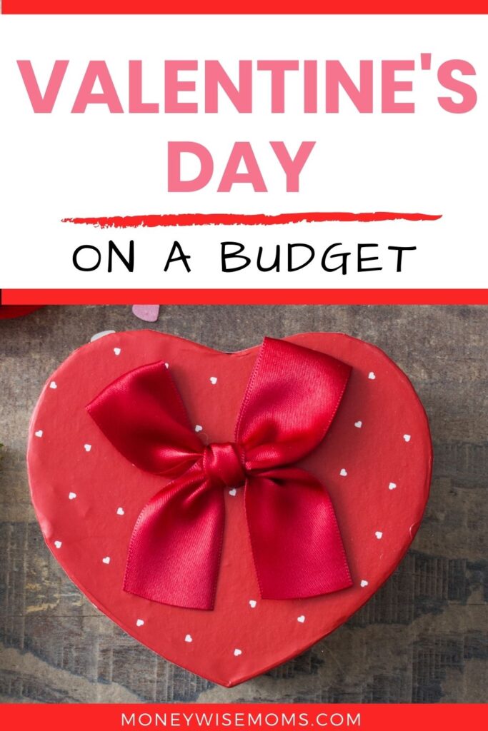Red heart-shaped box with red ribbon | how to celebrate Valentine's Day on a budget