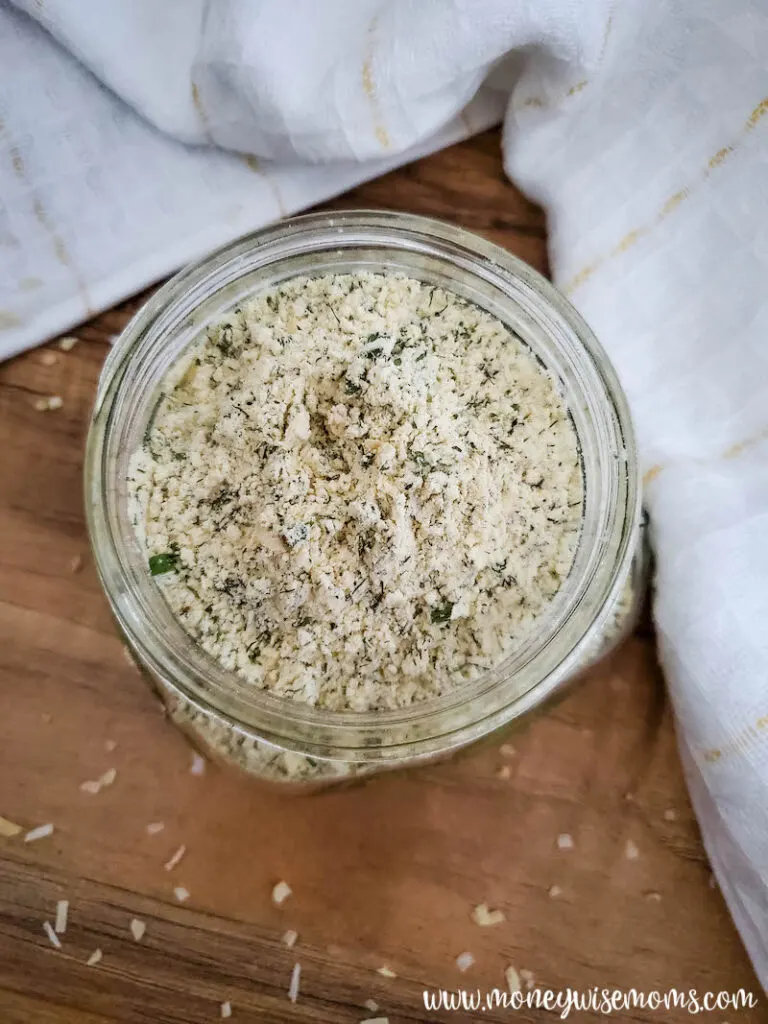 top down view of finished seasoning mix in a glass jar. 