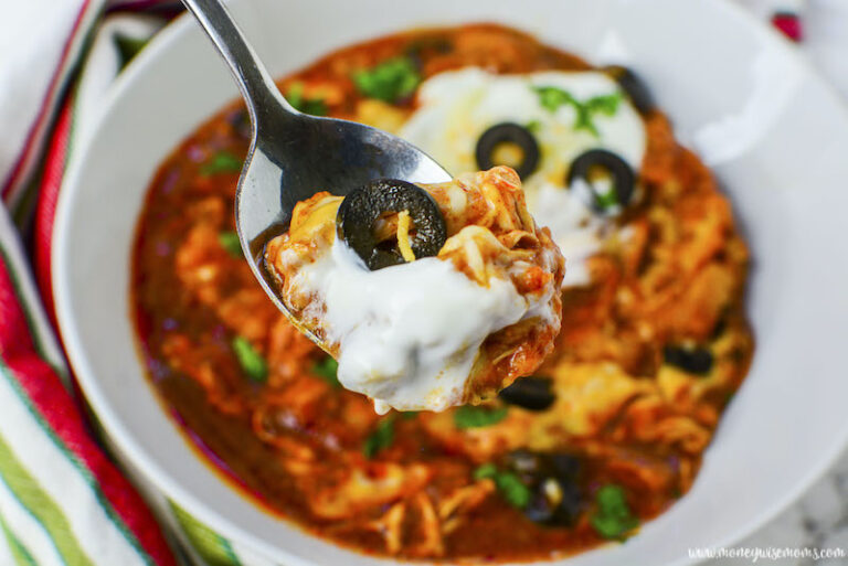 Featured image showing the finished slow cooker chicken enchiladas ready to serve.