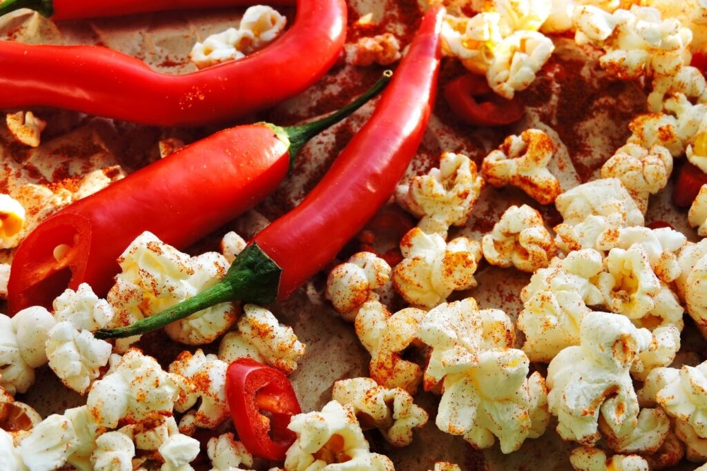 spicy popcorn with red peppers - popcorn topping ideas
