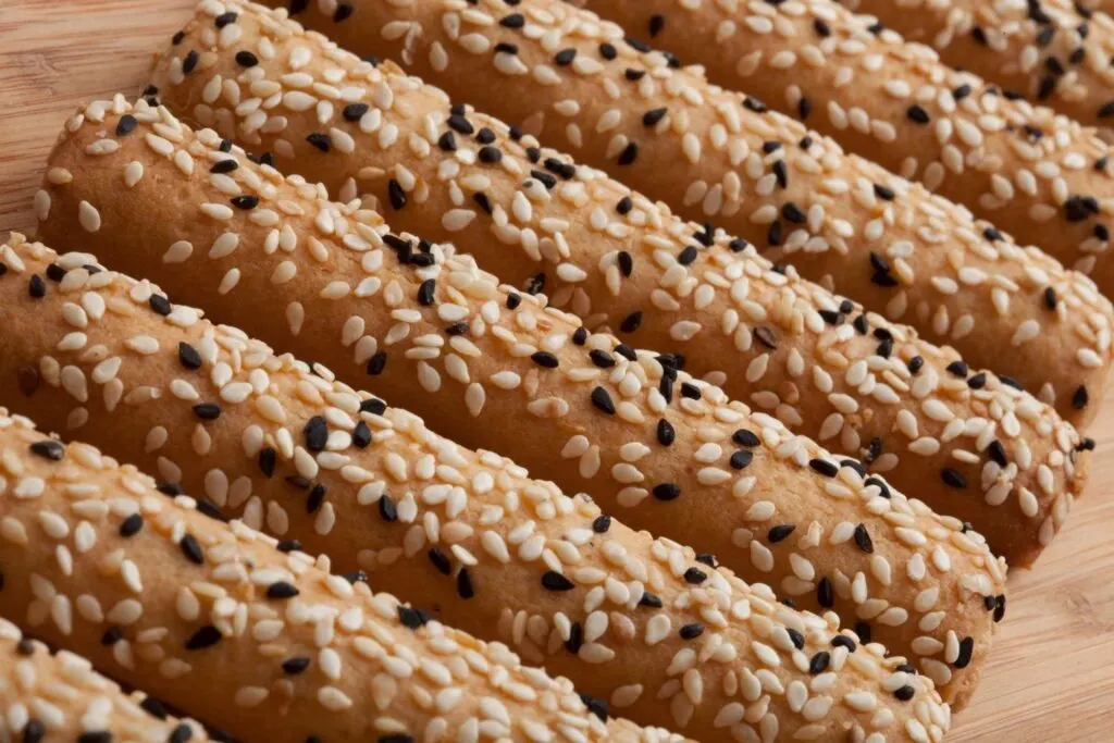 pretzel rods coated in sesame seeds