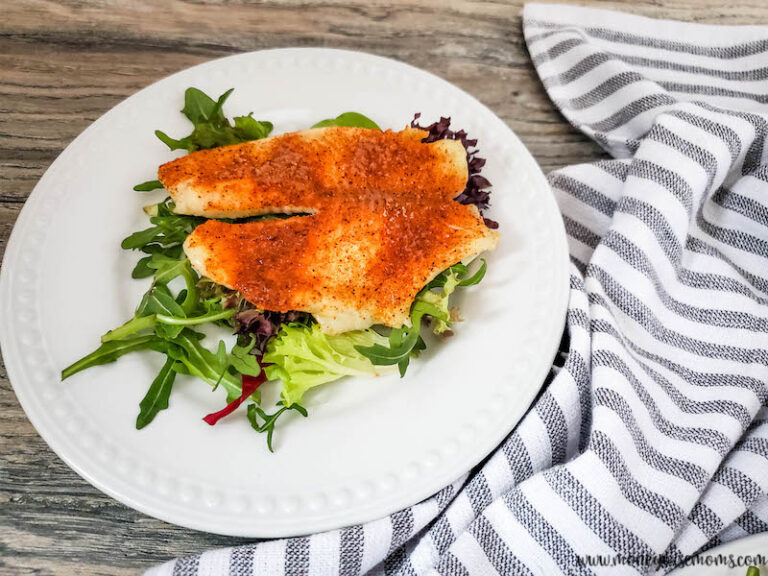 featured image showing finished southern baked tilapia ready to eat.