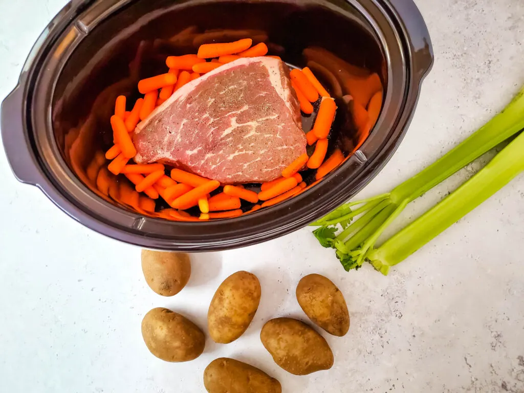 carrots added to the crockpot 