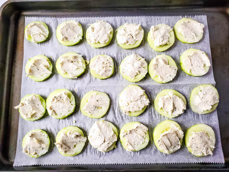 cream cheese mixture added to cucumber slices