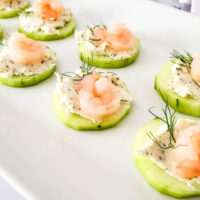horizontal view finished shrimp on cucumber appetizers
