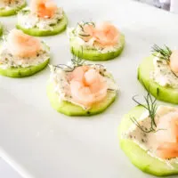 horizontal view finished shrimp on cucumber appetizers