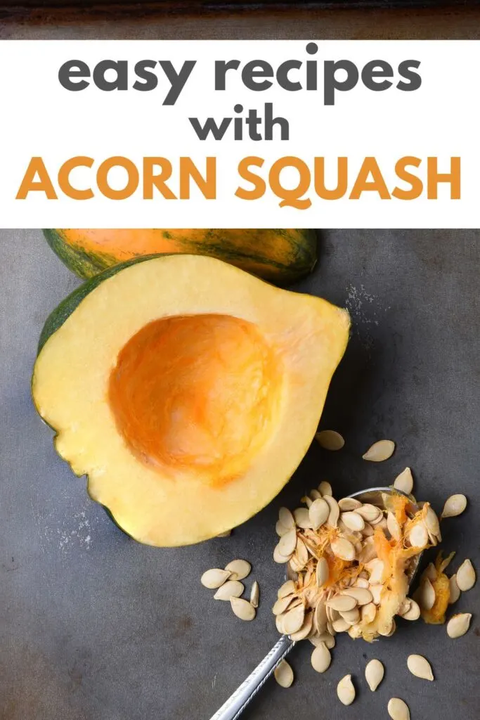 open acorn squash with spoon and seeds
