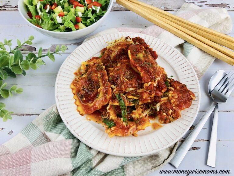 featured image showing a plate full of the finished baked ravioli lasagna ready to eat