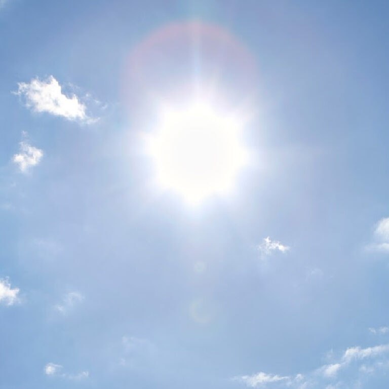 Hot sun in sky